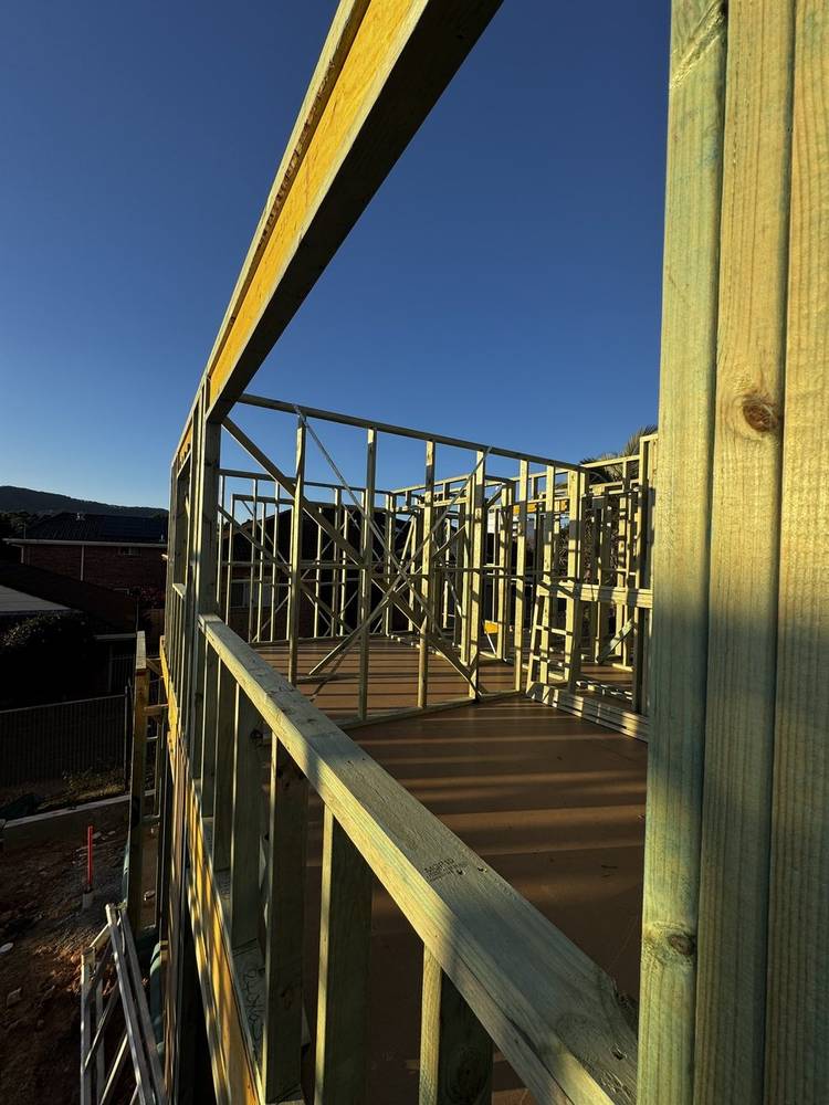 Finished timber frame against the sky