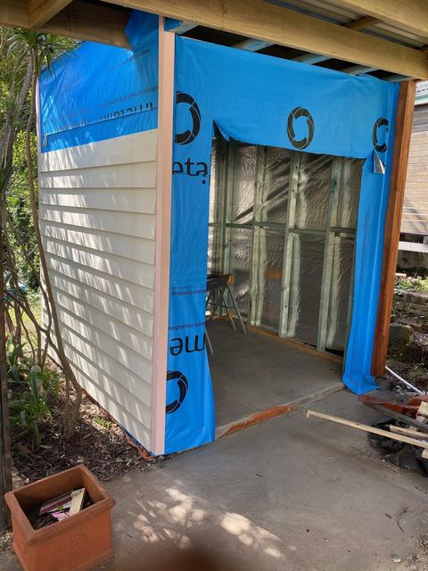 Framed room wrapped and at lock-up